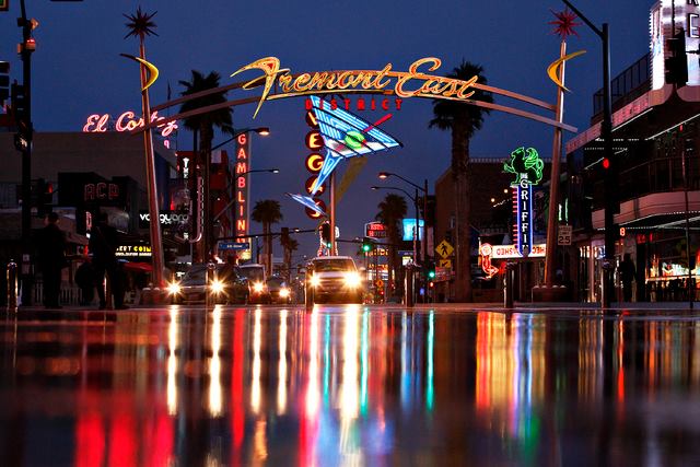 street level shot of the Fremont East District sign at night