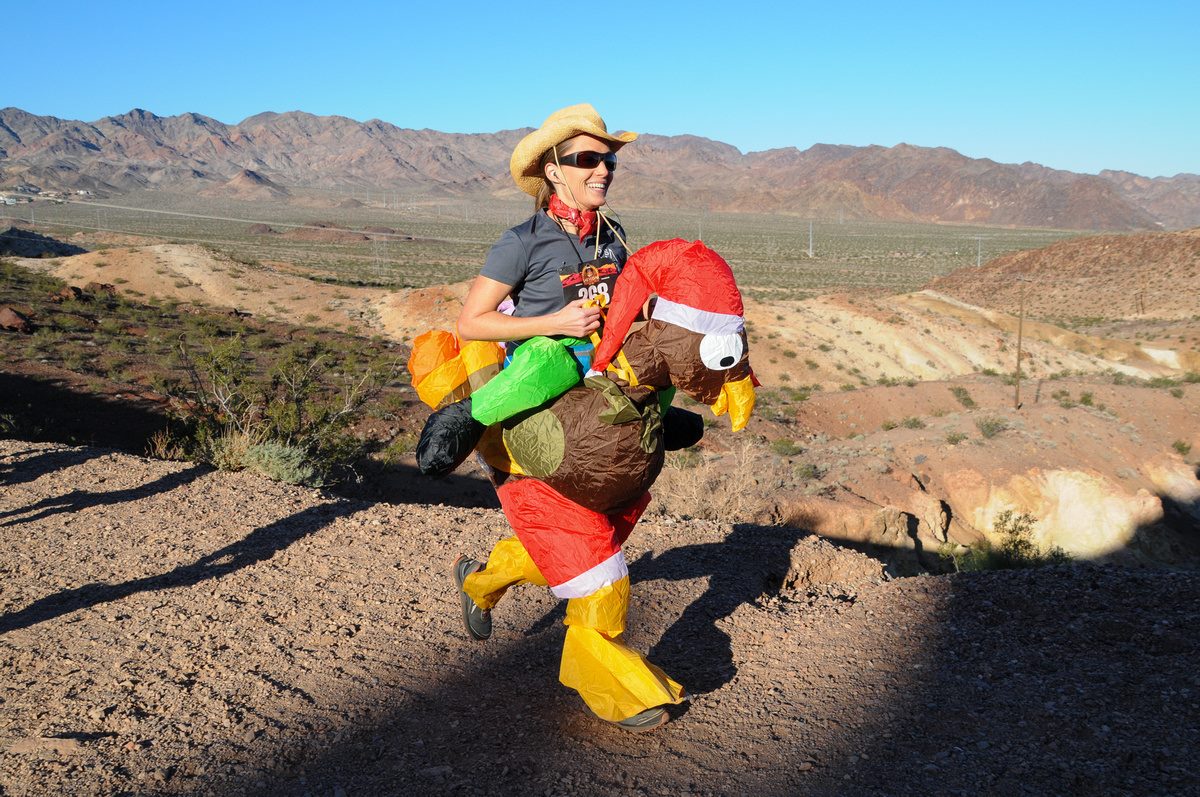 marathon runner in an inflated turkey outfit