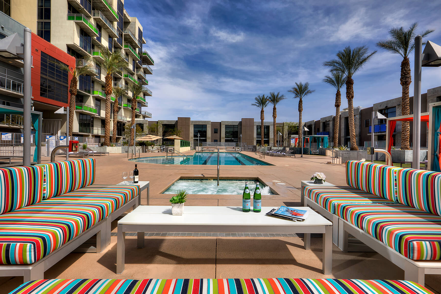 resort condo pool with lounges