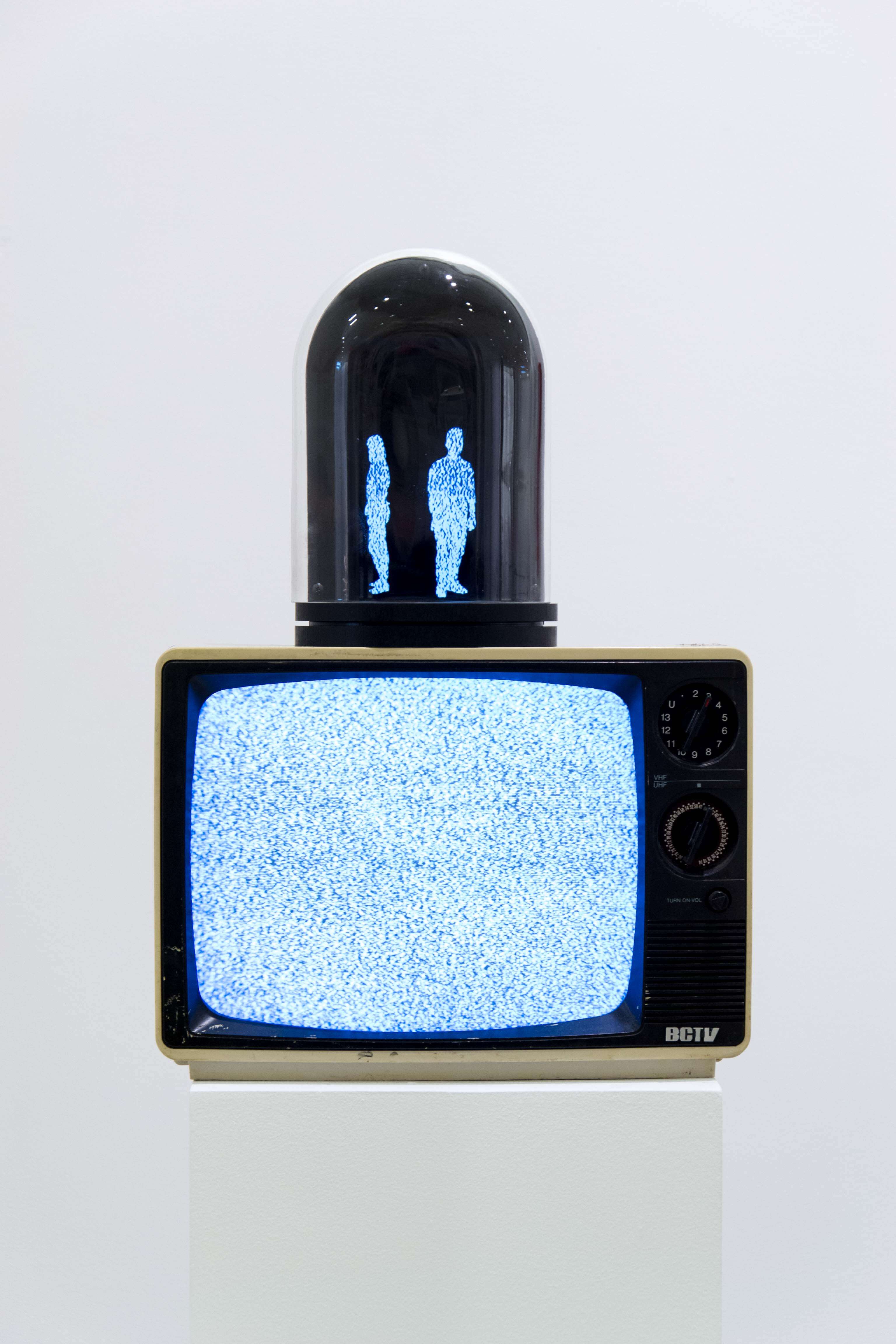 tv art installation with hologram people