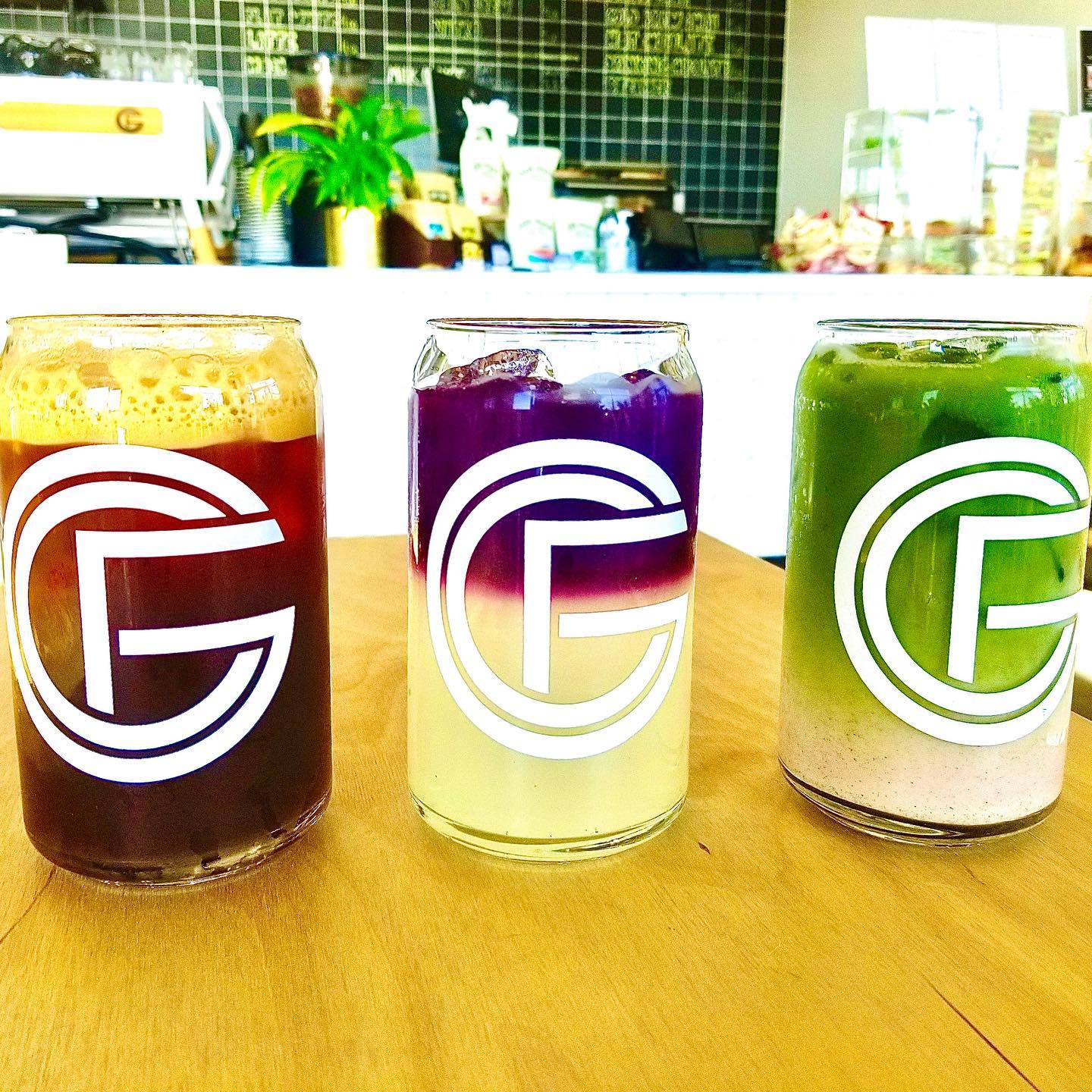 fresh juices in pint glasses